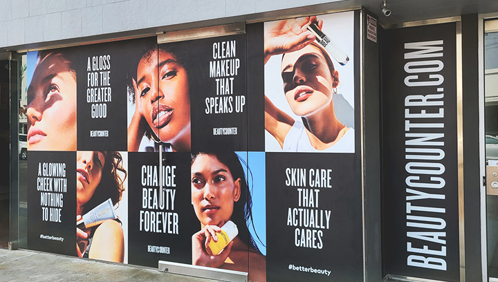 Beauty Counter promotional window signs displaying beauty sayings made of opaque vinyl