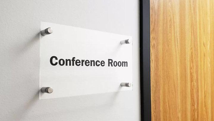 Conference room lobby plaque made of acrylic and installed with metallic standoffs