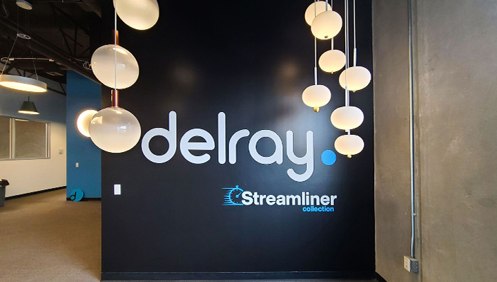 Delray Streamliner office wall decals with brand name lettering made of opaque vinyl