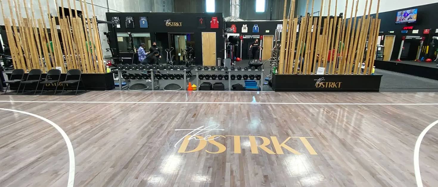 The DSTRKT floor decals displaying the brand logo made of opaque vinyl for interior branding