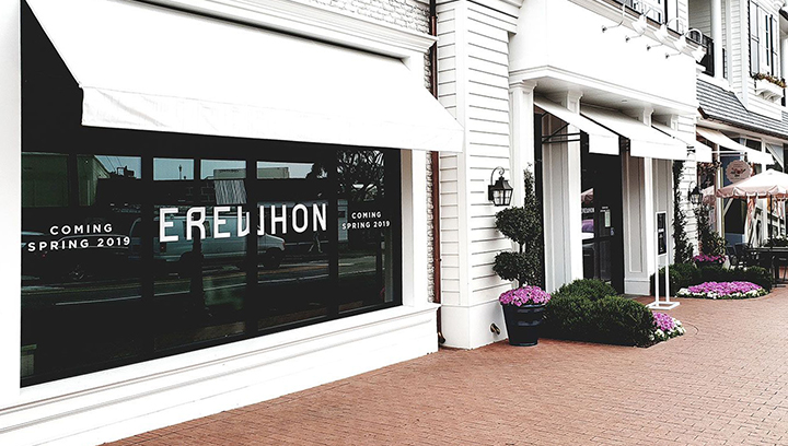Erewhon window lettering sign in white made of opaque vinyl for outdoor branding