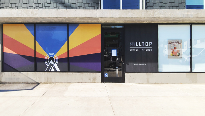 Hilltop restaurant window decals displaying colorful graphics made of opaque vinyl