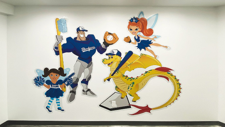 cut-out wall decals displaying cartoon characters made of opaque vinyl for interior decorating