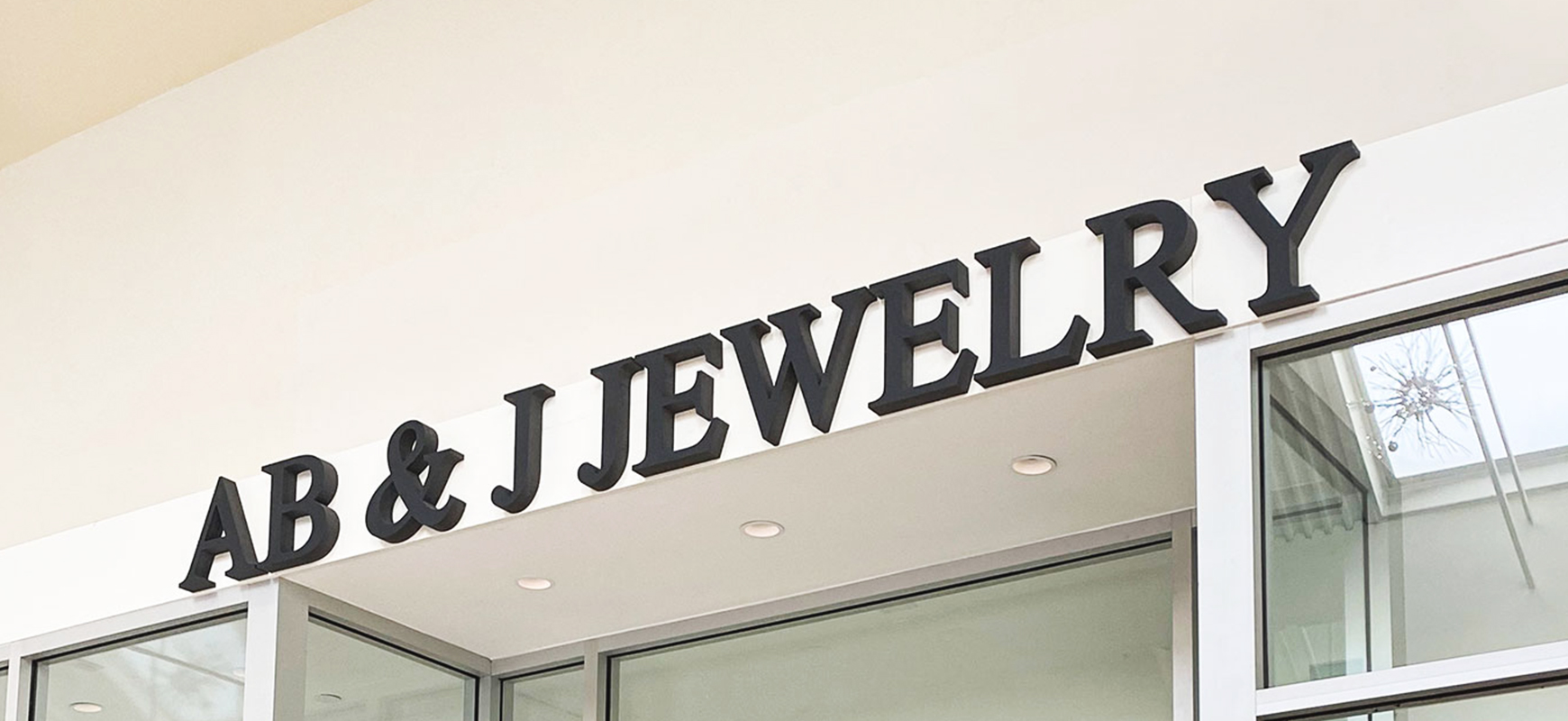 Ab & J Jewelry foam board sign with brand name 3d letters for storefront branding