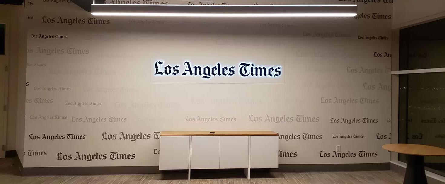 LA Times office signage displaying the brand name made of opaque vinyl, aluminum and acrylic