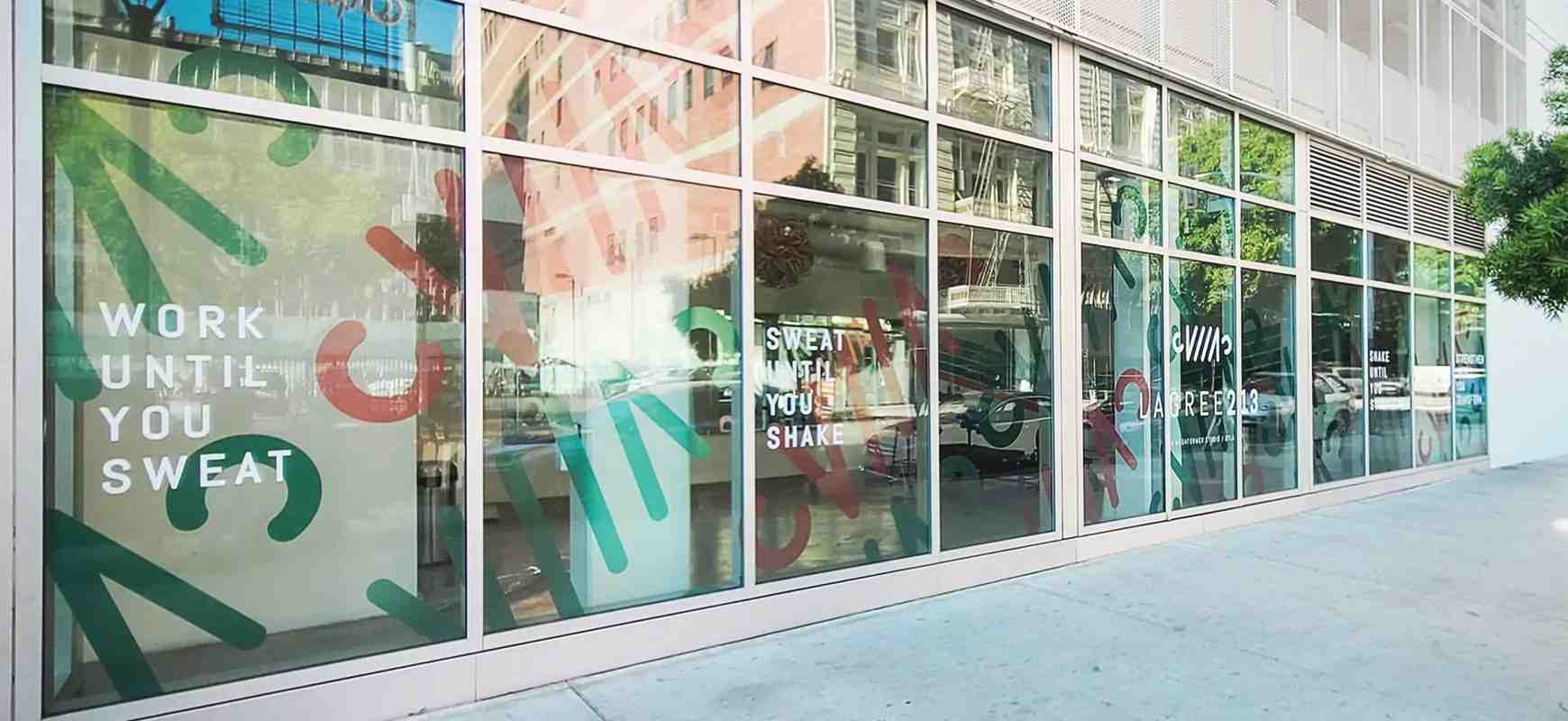 Lagree213 window decals made of clear vinyl and opaque vinyl for storefront branding