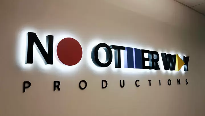 Illuminated lobby signs for No Other Way office made of acrylic and aluminum