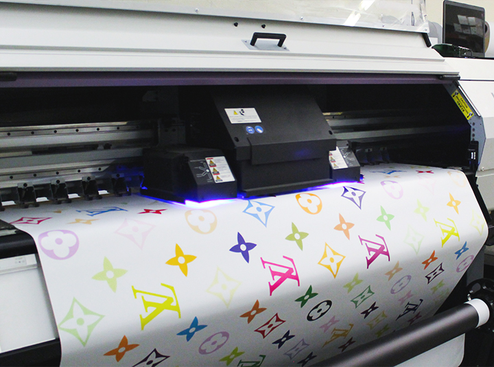 Louis Vuitton window decal printing process on opaque vinyl banner