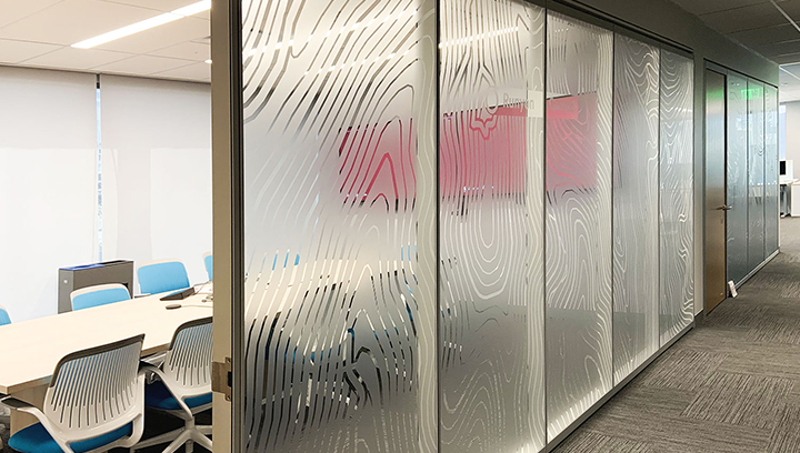 Neutrogena privacy custom vinyl decals made of frosted vinyl applied to conference room windows