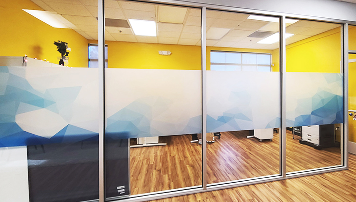Custom indoor window decals made of frosted vinyl strips for office decor