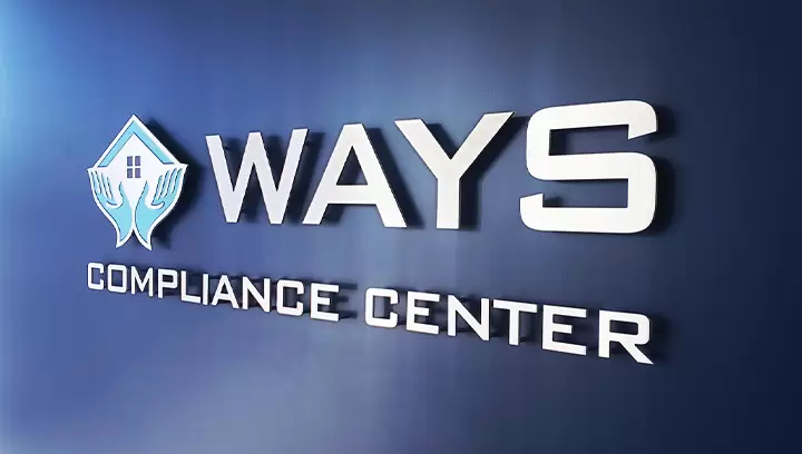 Polished lobby signs for Ways Compliance Center office displaying company name and logo