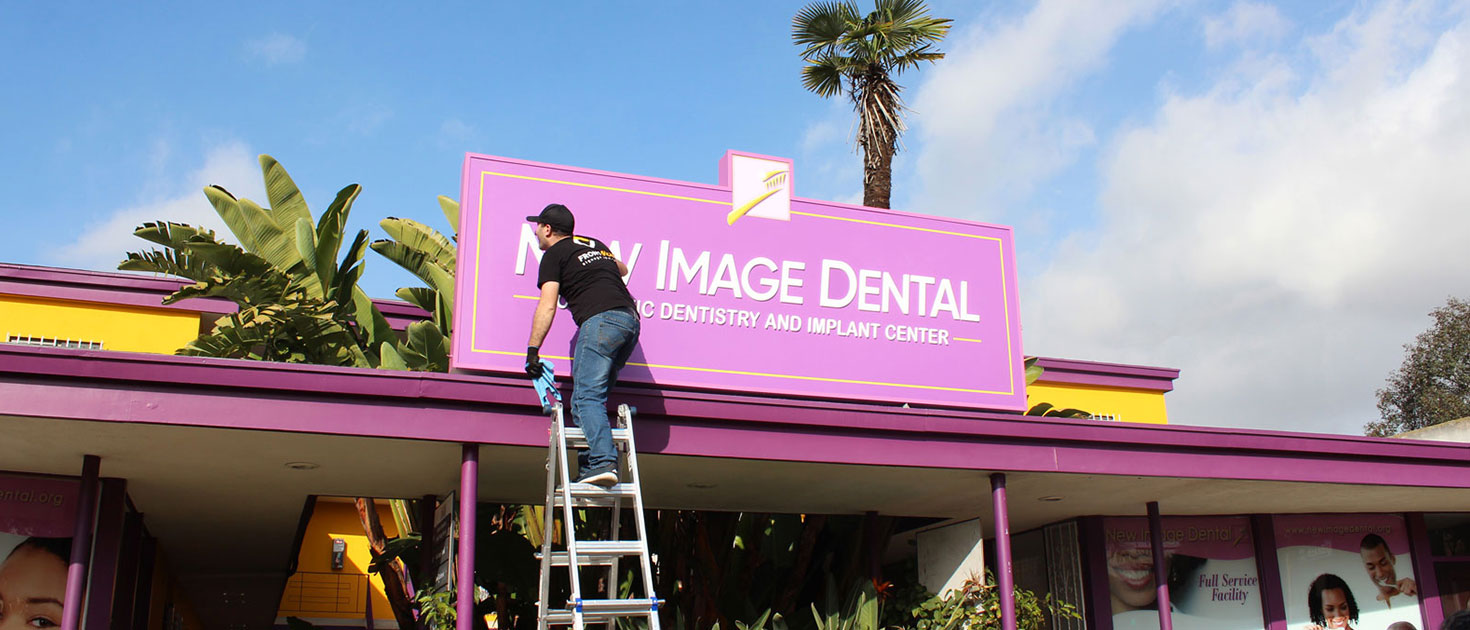 New Image Dental sign repair of the facade display made of aluminum and acrylic for branding