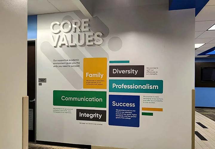SJVC office lobby signs displaying the brand values made of acrylic and opaque vinyl