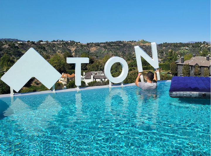 Tonal signage repair of a pool event display made of aluminum and acrylic for branding