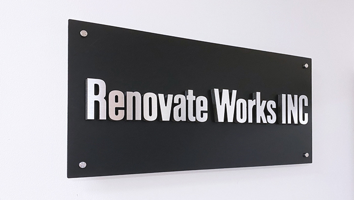 Renovate Works Inc brand wall lobby sign on ultraboard