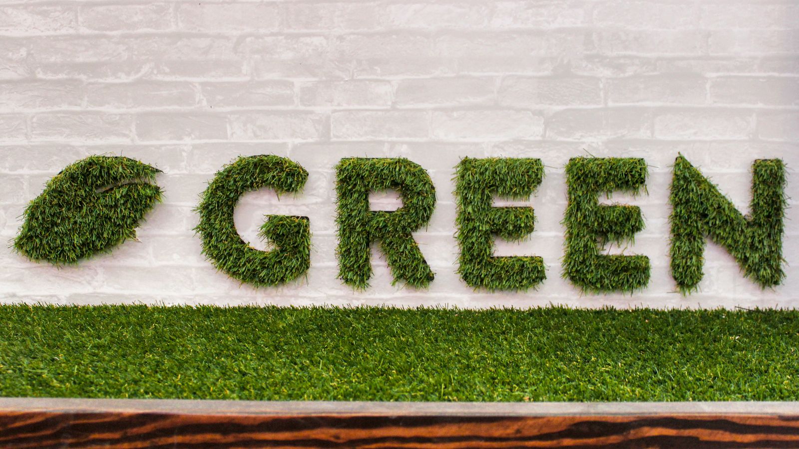 Artificial grass sign