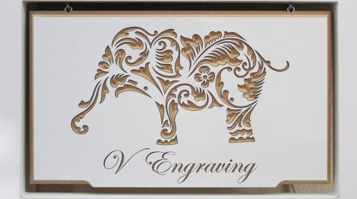 Elephant engraved on wood