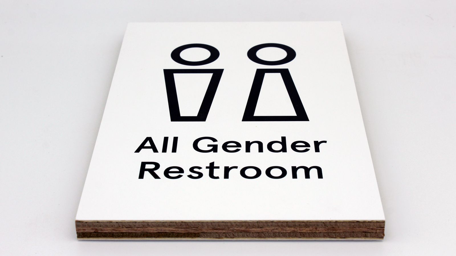 Plywood restroom sign