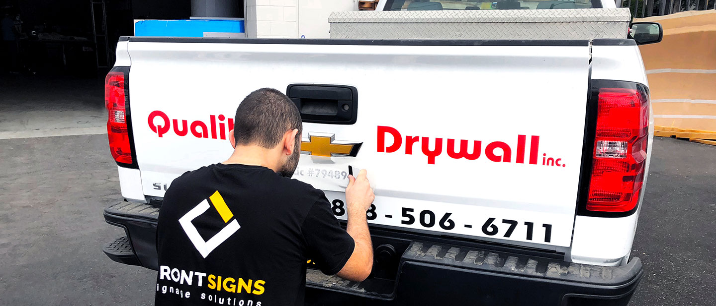 Promotional vehicle wrap installation process Front Signs
