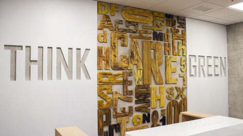 Ameriabank custom lobby signs with wall engraved message and cut out letters made of wood