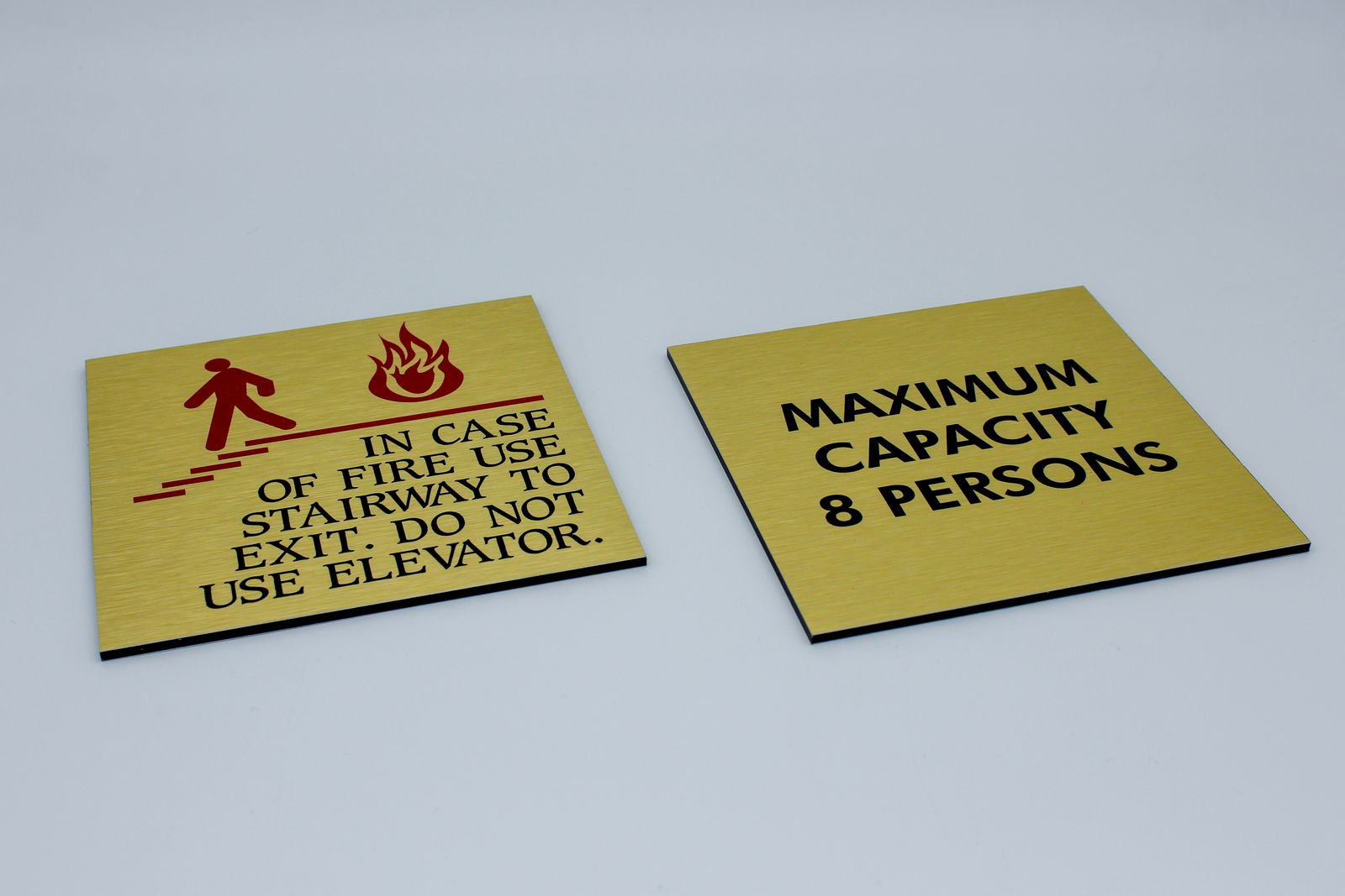 brushed aluminum warning signs