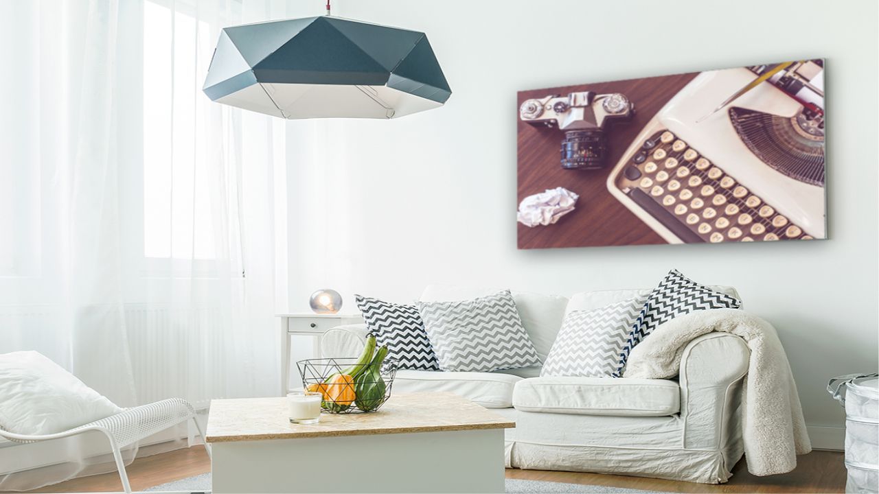 decorative interior canvas sign with a picture print of an antique typewriter and a camera
