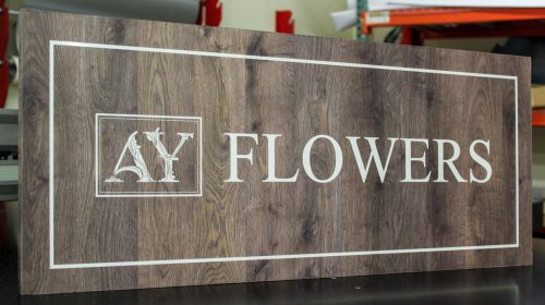 flowers wooden sign