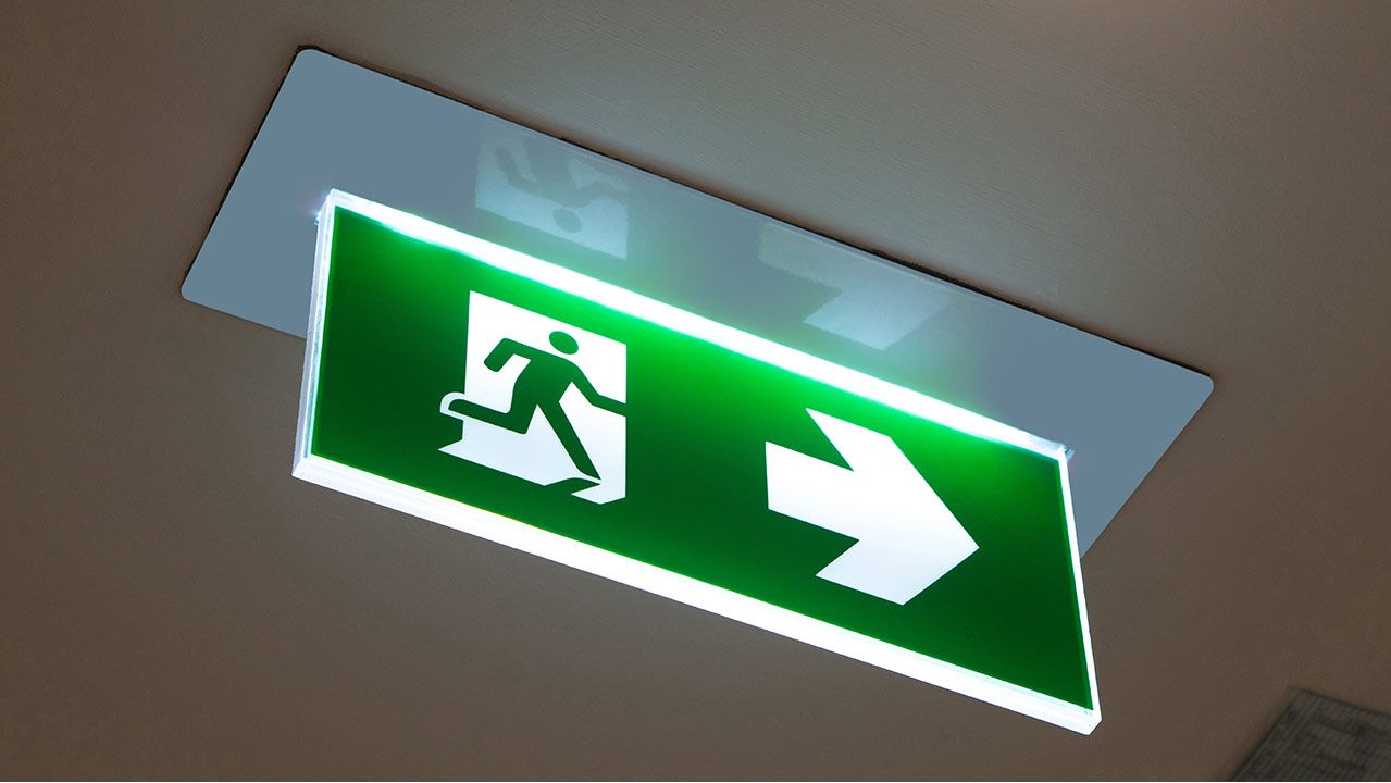 illuminated directional sign