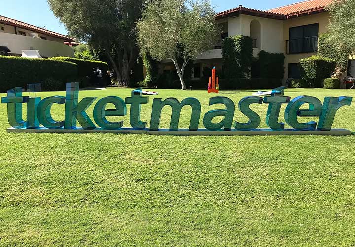 Ticketmaster trade show sign made of 3D letters in a transparent green acrylic