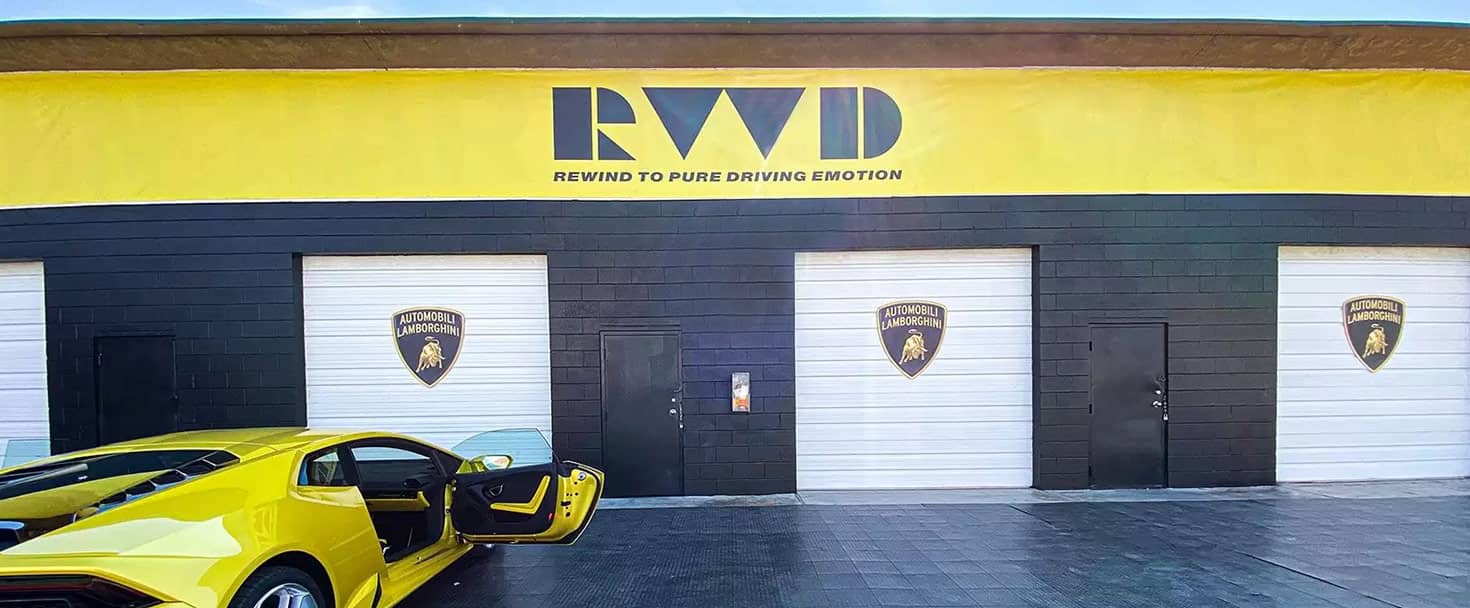 Lamborghini custom banner in yellow displaying the brand's motto made of vinyl for branding