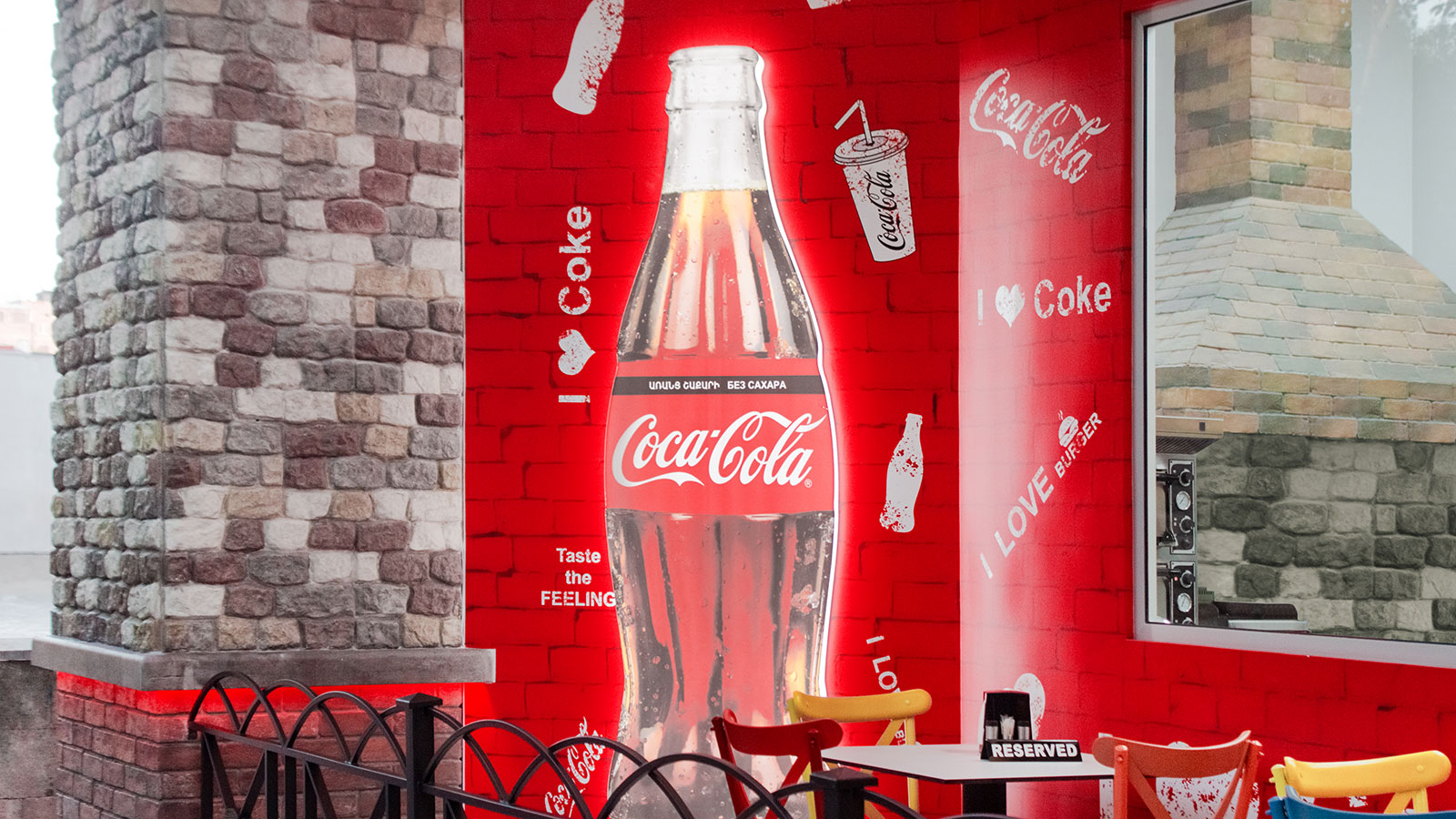 Coca-Cola custom light box in the shape of the branded bottle made of acrylic for branding