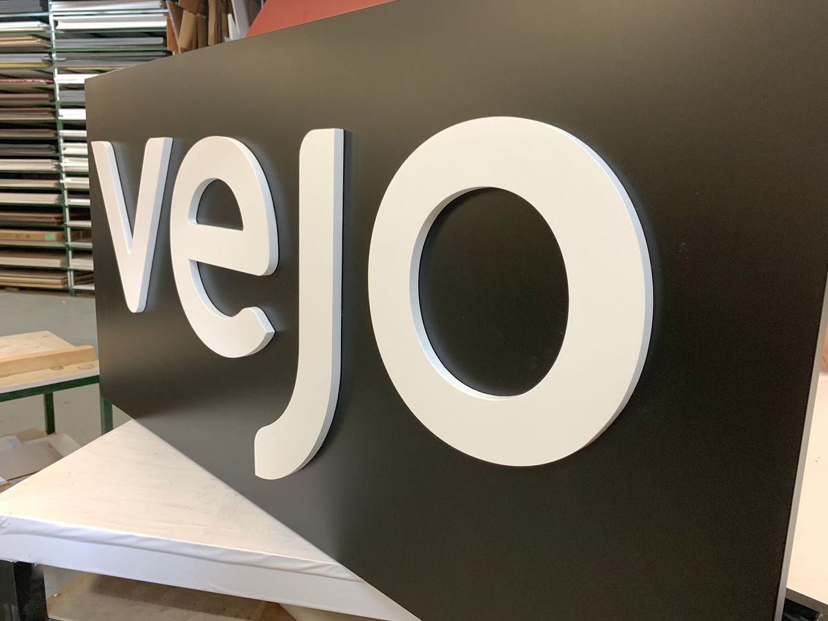 black and white logo sign