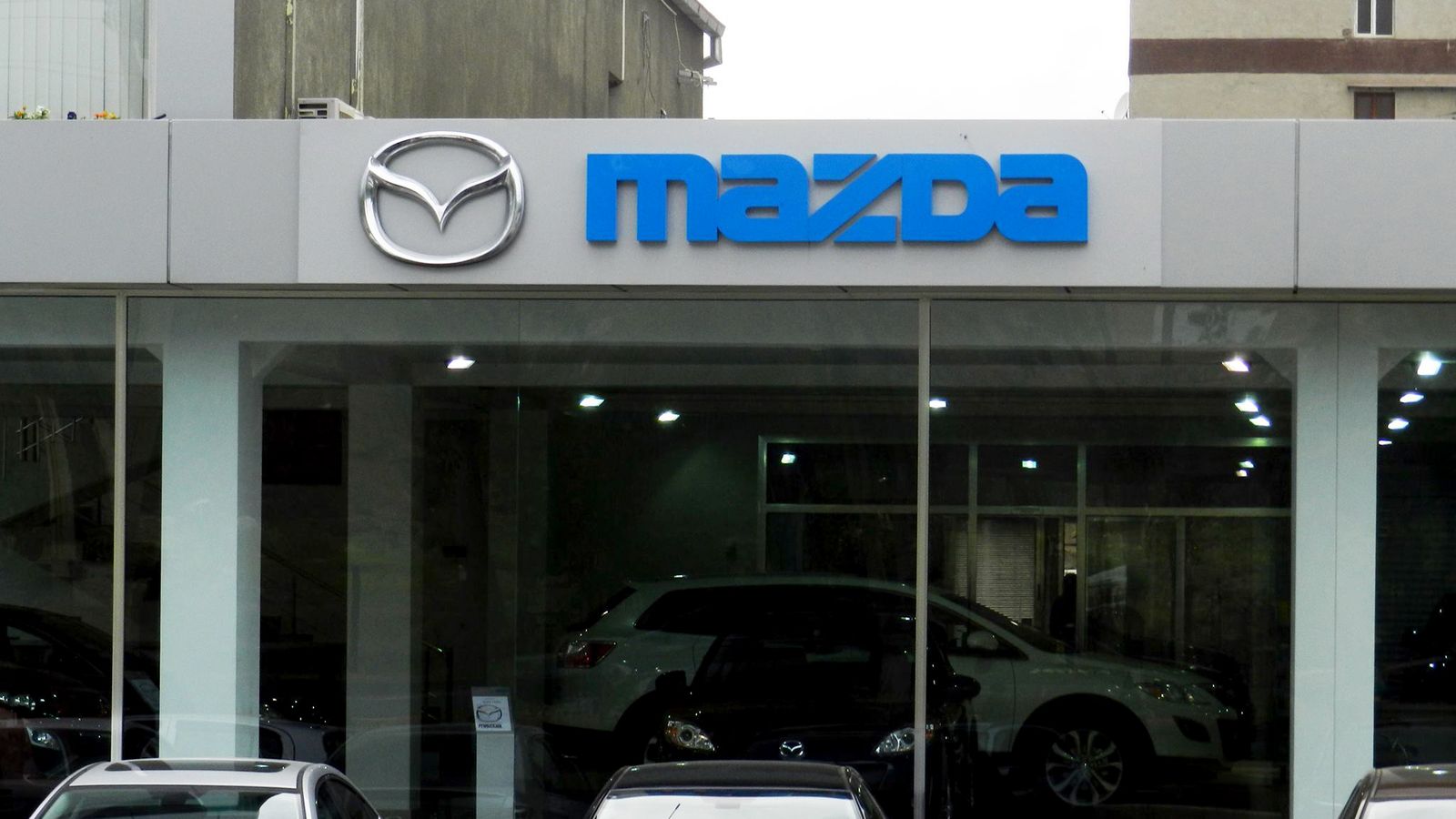 Mazda 3d logo sign and letters made of aluminum and acrylic for car salon storefront branding