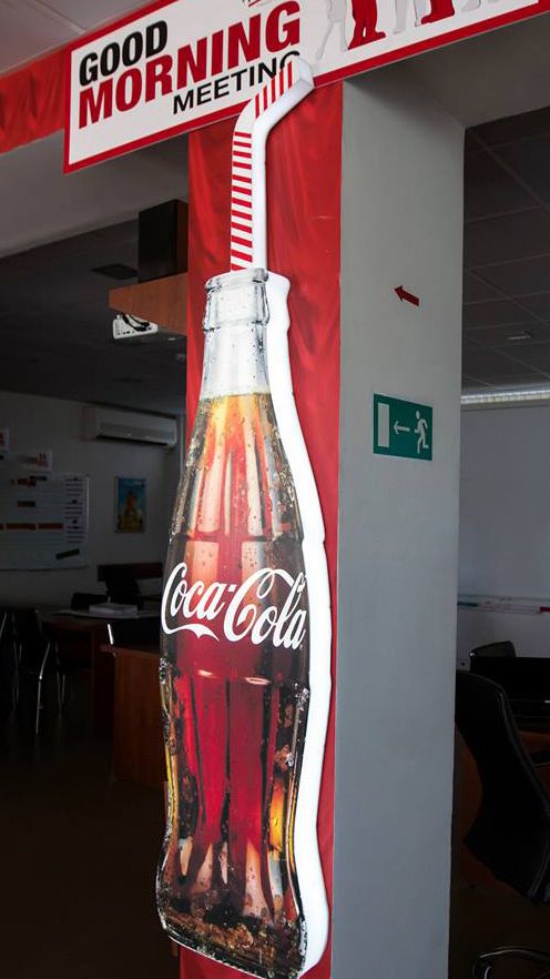 Coca-Cola side-lit custom light box in the shape of a bottle made of aluminum and acrylic