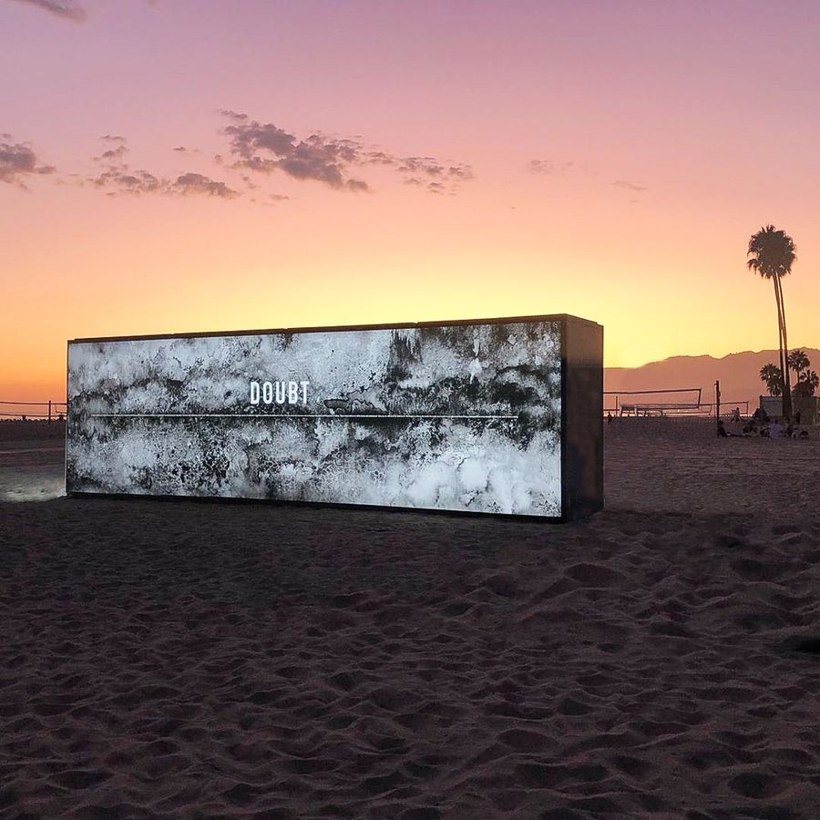 Annenberg large light box made of aluminum, Lexan, and backlit vinyl during the installation