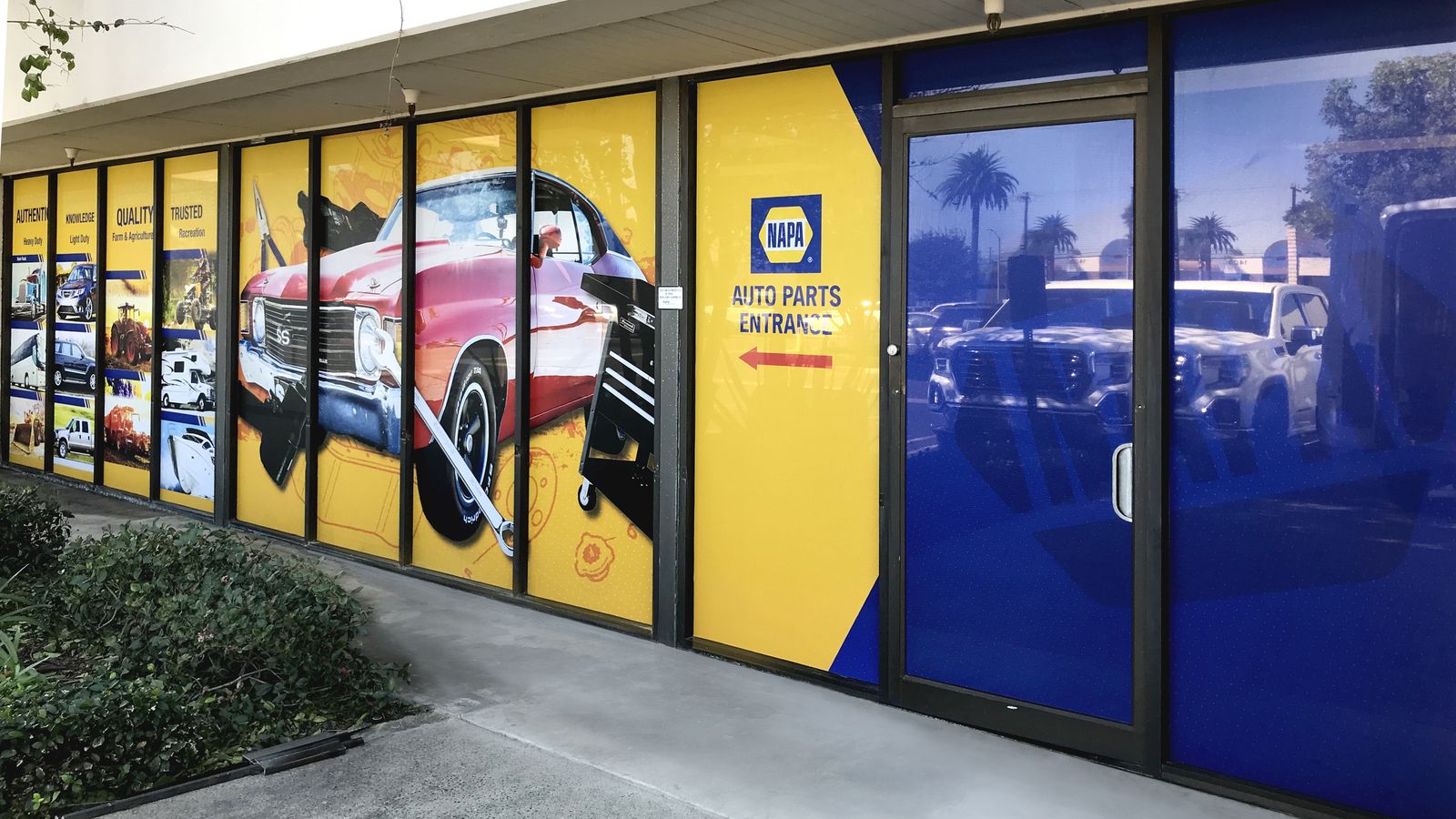 Perforated storefront window decals