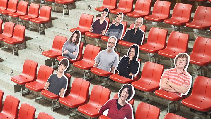 custom stadium human cut-out signs displayed on red seats