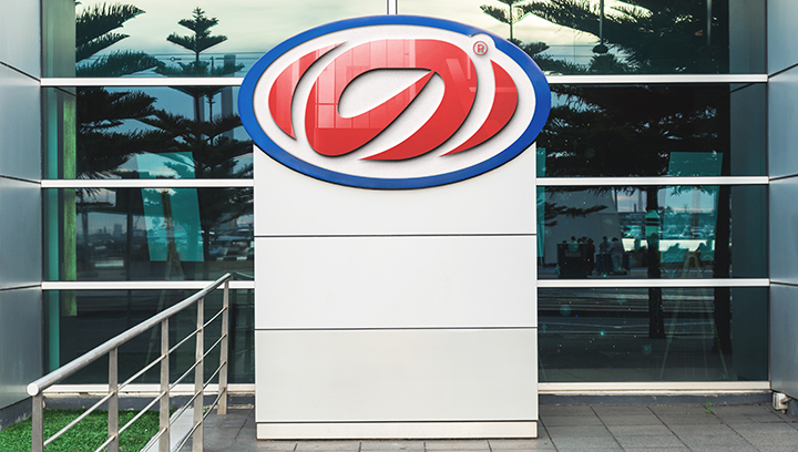 outdoor stadium plaza signage displaying a red logo