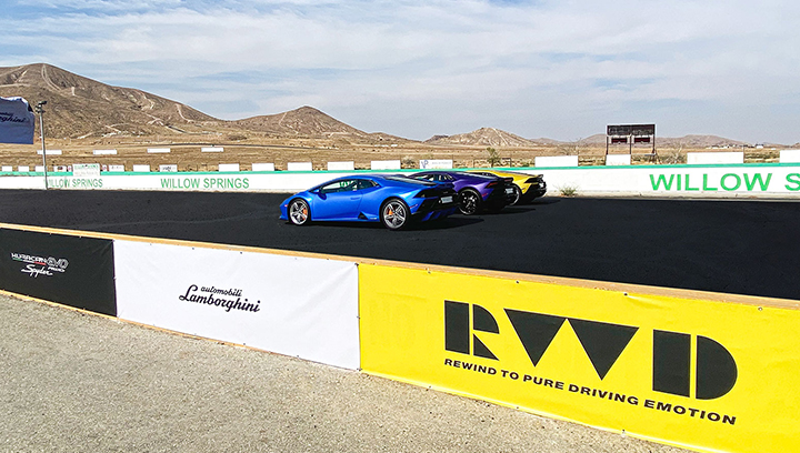 Lamborghini sports event signs in white, black, and yellow made of vinyl banner for branding