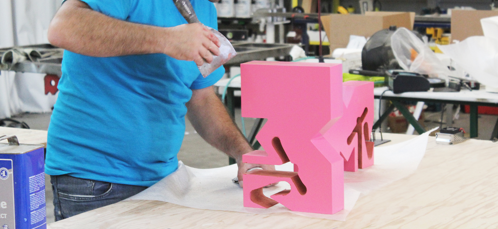 the making process of MTV event logo signs in pink made of PVC