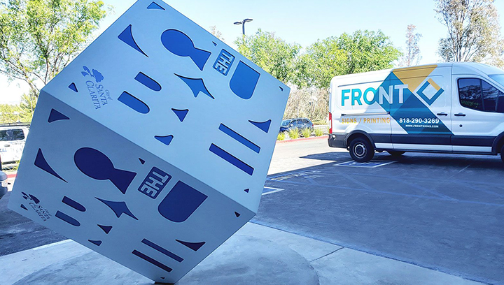 The Cube event branding signs in a big box shape made of aluminum