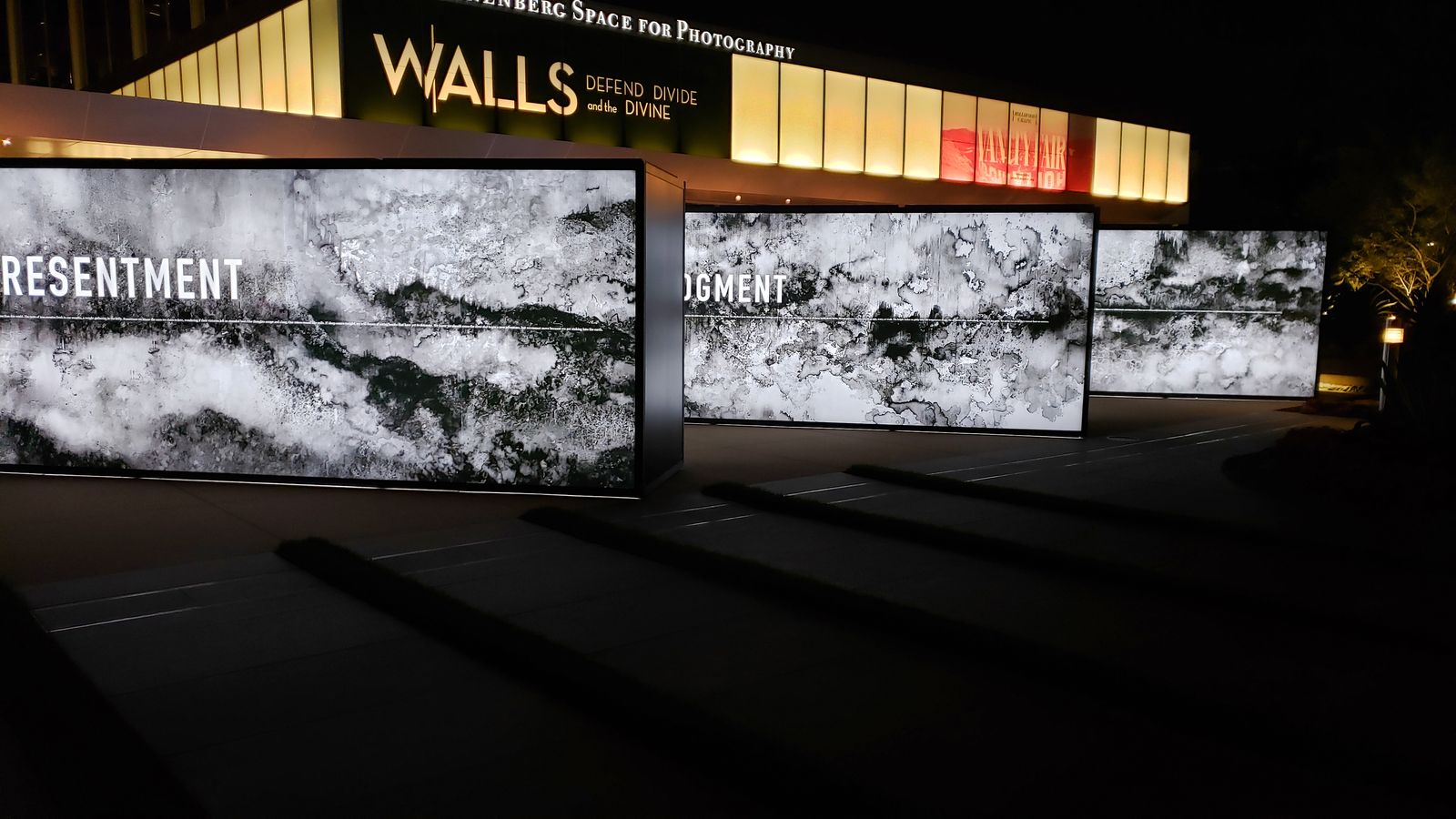 Annenberg 3 large light boxes displaying different words made of acrylic and aluminum