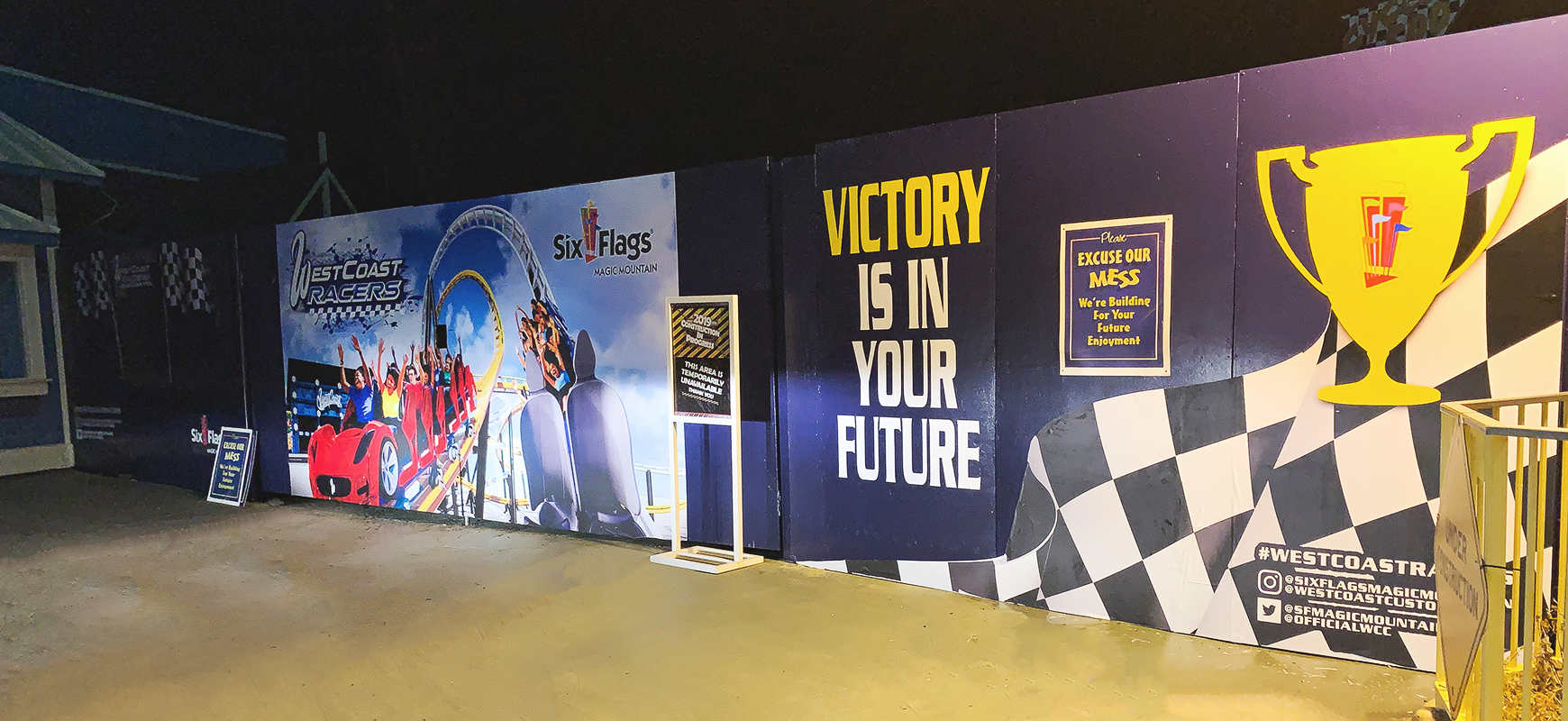 Six Flags adhesive event sign made of Dibond and opaque vinyl for trade show wall branding