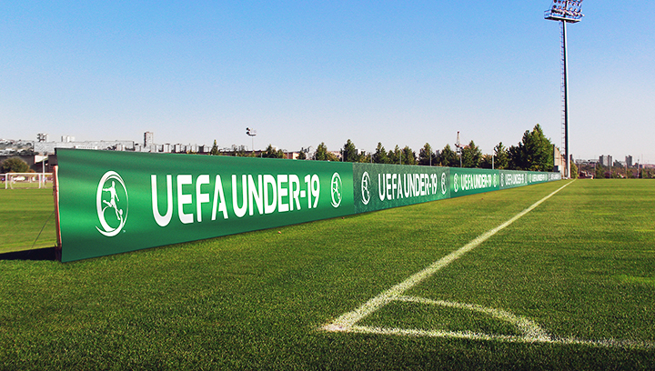 UEFA football stadium signage displaying the championship name made of vinyl