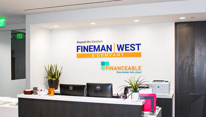 Fineman West interior bank signage made of acrylic for reception branding