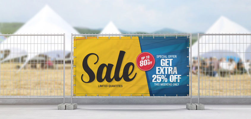 Sale banner example on barrier for outdoor event marketing