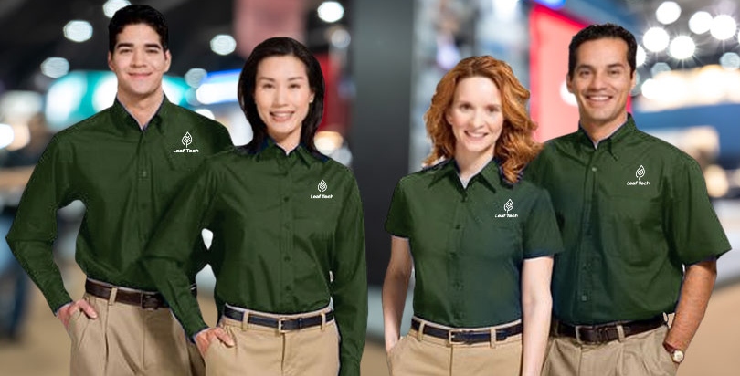 staff wearing green brand logo t-shirts at event Staff at expo wearing green branded shirts