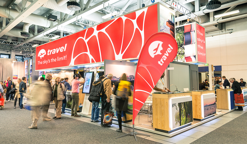 Travel trade show booth flag Travel trade show booth design example with flag