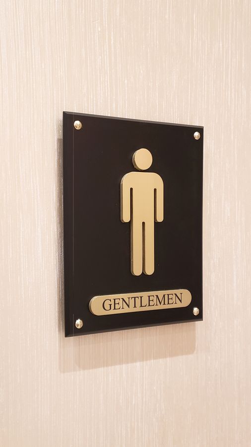 wall-mounted interior sign displaying the word Gentlemen made of aluminum for wayfinding