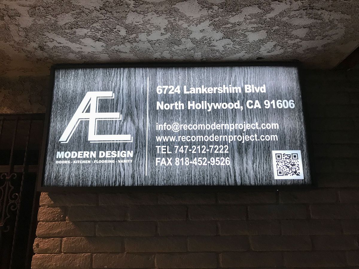 Reco Modern Project exterior light box with contact information made of aluminum and acrylic
